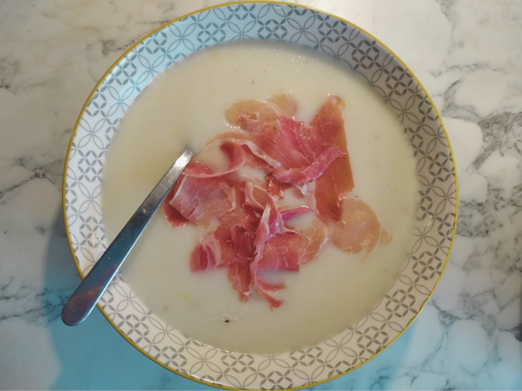 Bowl of melon soup on counter